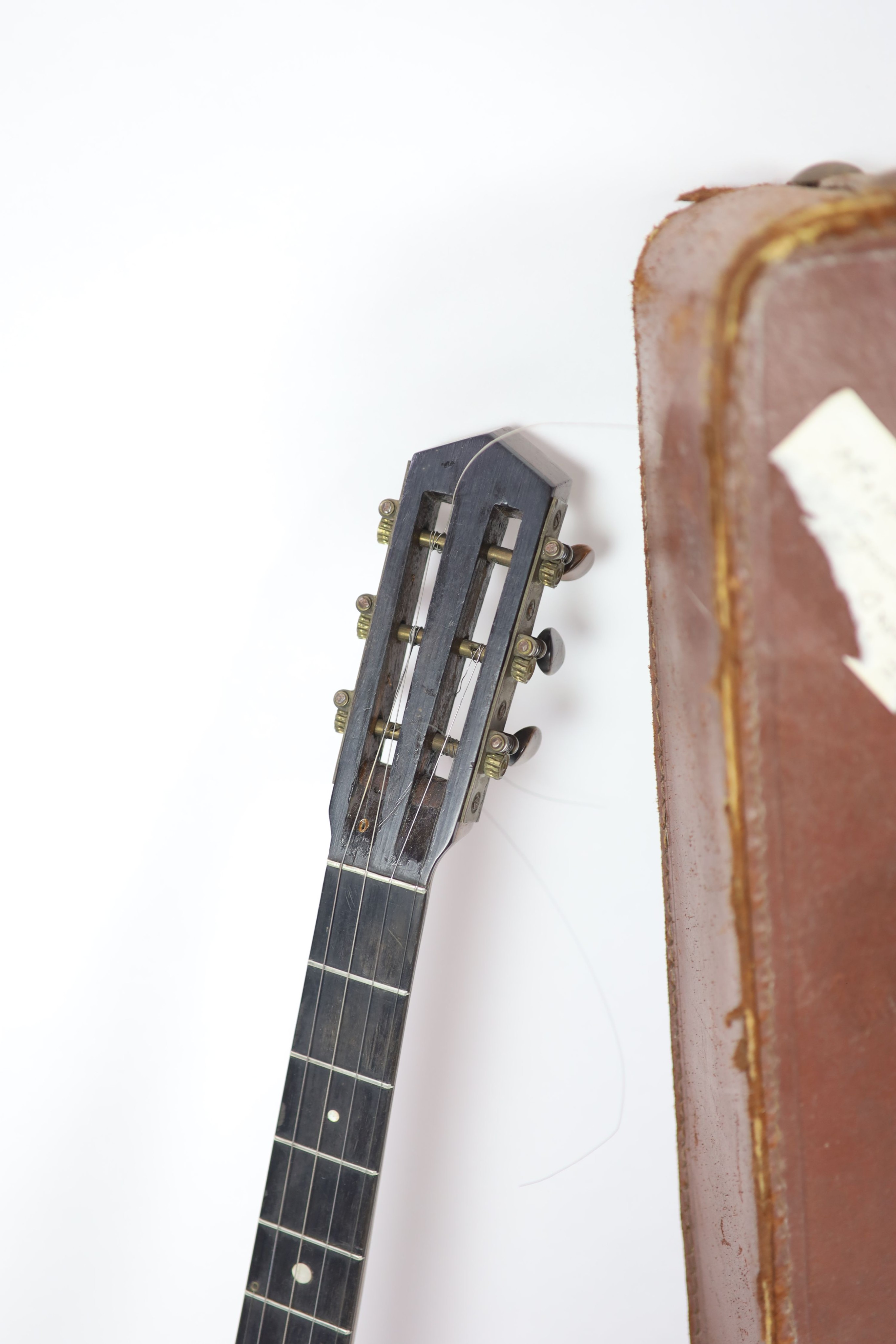 A Clifford Essex banjo overall 90cm, with distressed leather case